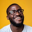 © bvbflo1 - Man wearing glasses smile happy face portrait with yellow background