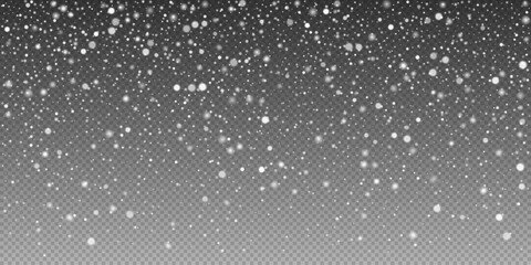 glittering snowflakes in mid air on transparent background. snow overlay effects creating a peaceful