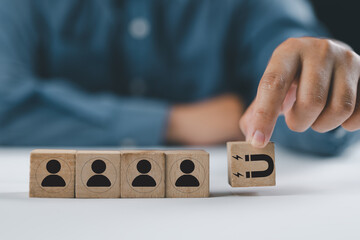 customer retention concept. inbound marketing strategy. attracting potential customers. hand puts wo