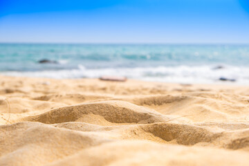 Nature of the beach and sea Summer with sunshine, sandy beaches, clear blue waters sparkling against the blue sky. On an island with good ecology and environment Background for summer vacation concept