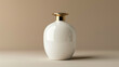 © Izzain - White ceramic bottle with a gold lid on a beige background.