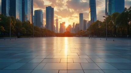 Empty asphalt square and modern Shanghai skyline at sunset