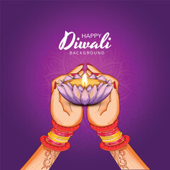 Happy diwali oil lamp for women hand holding diya background