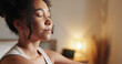 © PeakPoints/peopleimages.com - Woman, calm and yoga in home for meditation, mindfulness and holistic health with peace. Female person, fitness and relax in apartment for zen, chakra and healthy mind with wellness exercise
