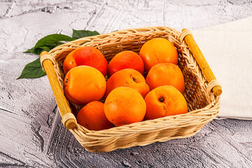 Raw ripe sweet apricots heap