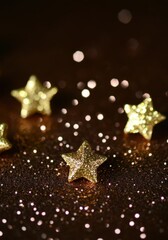 Wall Mural - sparkling golden stars on festive dark background