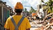 © CStock - A resilient construction worker for disaster recovery and rebuilding scene, showing workers helping communities rebuild homes and infrastructure after natural disasters,