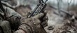 © Ai Studio - Mud-streaked hands grip a rifle tightly, capturing the grit and intensity of a soldier entrenched in rugged terrain.
