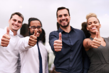 Business people, portrait and team with thumbs up for success, positive feedback or winning. Young, group or employees with smile, like emoji or yes sign for OK, review, vote or agreement together