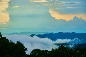 The sky is blue and cloudy with a few clouds in the distance