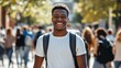 © Maiiecon9 - Smiling Student Walking Through Busy College Campus On A Sunny Day