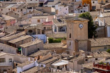 View of the roofs of the old town of Caravaca de la Cruz in the Region of Murcia, Spain, with the clock tower between them