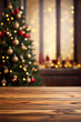 © Юлия Васильева - Empty wooden table in front of christmas tree with bokeh background