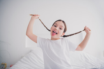 Sticker - Portrait of positive funny nice adorable girl enjoying carefree weekend time flat white light room interior indoors