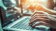 © Prichachai - Close-up of hands typing on a laptop keyboard with virtual icons, representing technology, communication, and software development.