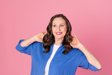 Sticker - Photo portrait of nice pensioner female look empty space hold hair wear trendy blue outfit isolated on pink color background