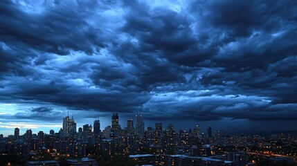 Wall Mural - A city skyline at dusk with dark clouds rolling in and distant lights glowing