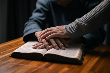 Person raised their hand in prayer at the church, embodying their Christian faith and belief in God, seeking hope and the holy presence of Christ through their devout religion. jesus christ, pray.