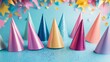 © Tadeusz - Colorful party hats arranged artistically on a vibrant background.