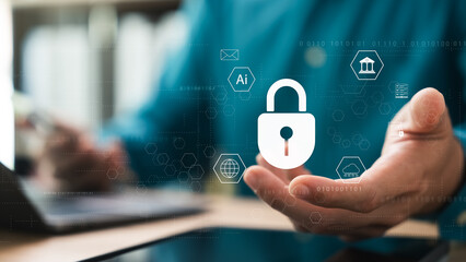 Wall Mural - cyber ​​security and internet data protection, businessman using laptop and tablet with padlock icon