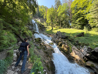 Wall Mural - Giessbach Falls in the eponymous nature park and over Lake Brienz - Giessbachfälle (Giessbachfaelle) im gleichnamigen Naturpark und über dem Brienzersee-Canton of Bern, Switzerland (Schweiz)