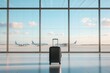 © justjupiter - Luggage in bright airport terminal with planes visible through large windows.