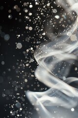 Wall Mural - A close-up shot of white smoke on a dark, black background