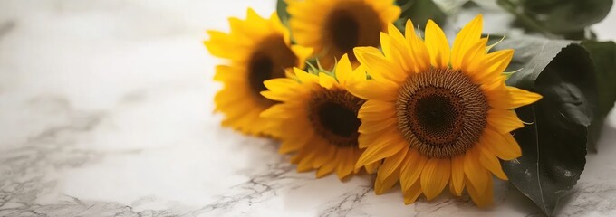 Poster - A bouquet of vibrant sunflowers on a marble surface, showcasing nature's beauty.