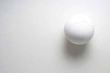 A white ball with a black line on it