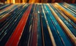 © olegganko - A close up view of colorful vinyl records stacked on a wooden shelf in a cozy music store