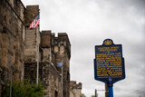 Fairmount Avenue entrance and historical marker at the Eastern State Penitentiary historic site.
