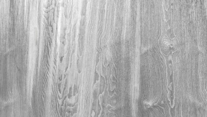 Poster - A wooden surface with a grainy texture. The wood is grey and has a natural look. The surface is smooth and has a slight shine to it