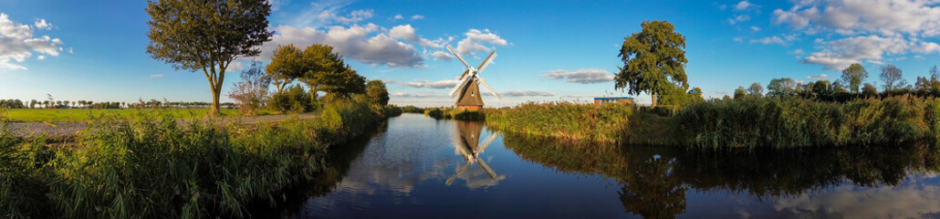 180 degree panorama of windmill in Netherlands