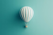 © Sekai - Hot Air Balloon Icon in 2D: Departing Cream on a Teal Sky