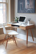 © Caseyjadew - Modern home office with wooden desk, white chair, and computer in a bright minimalist room