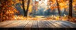 © Nattapat - Elegant representation of a wooden table placed in a tranquil autumn forest, with soft light highlighting the beauty of the changing seasons