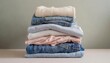 © Studio 100 - Heap of folded clothes. Generated image