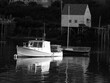 © Katie Dobies - Picturesque Stonington Maine Black and White Lobster Boat Reflection on Water