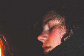 Wall Mural - A woman is sleeping with her head tilted to the side