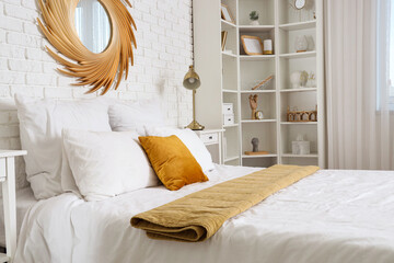 Canvas Print - Interior of light bedroom with big bed, mirror and shelf unit