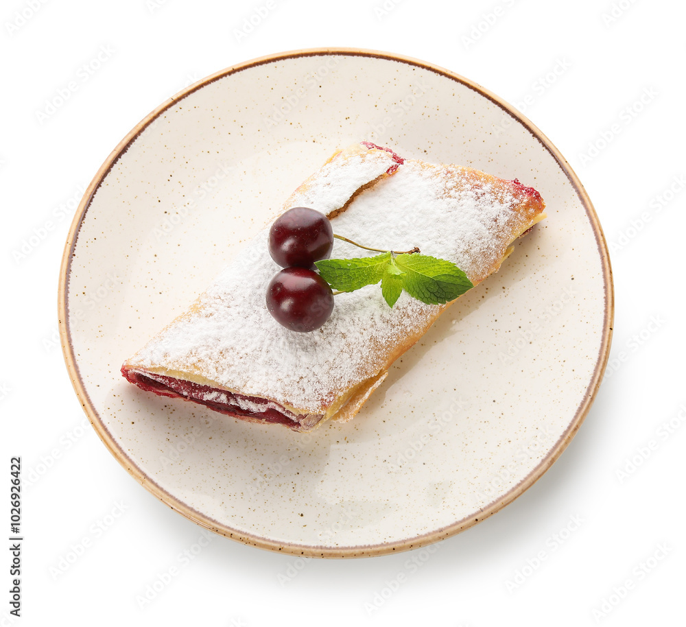 Plate with tasty cherry strudel and fresh berries on white background