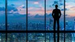 © CREATIVE STOCK - A business executive standing before a window, overlooking the city, deep in thought, representing self-reflection and responsibility for decisions, Accountability