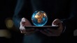 © KKC Studio - Hands Holding a Tablet with a Floating Globe Model
