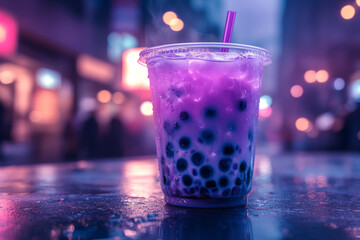 A single purple boba tea cup on a table at night with blurred city lights