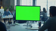 © พงศ์พล วันดี - Modern Startup Office with Green Screen Monitor