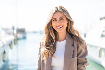 Pretty blonde Uruguayan woman With happy expression