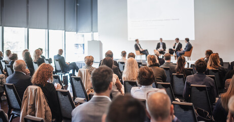 Wall Mural - interview and round table discussion at business convention and presentation. audience at the confer