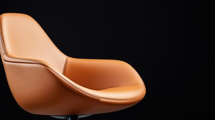 a close-up of a brown leather chair on a black studio background