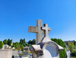 © olenadesign - gray catholic crosses and graves. Maribor cemetery.