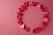 © Ilia - Heart-shaped paper wreath on pink background